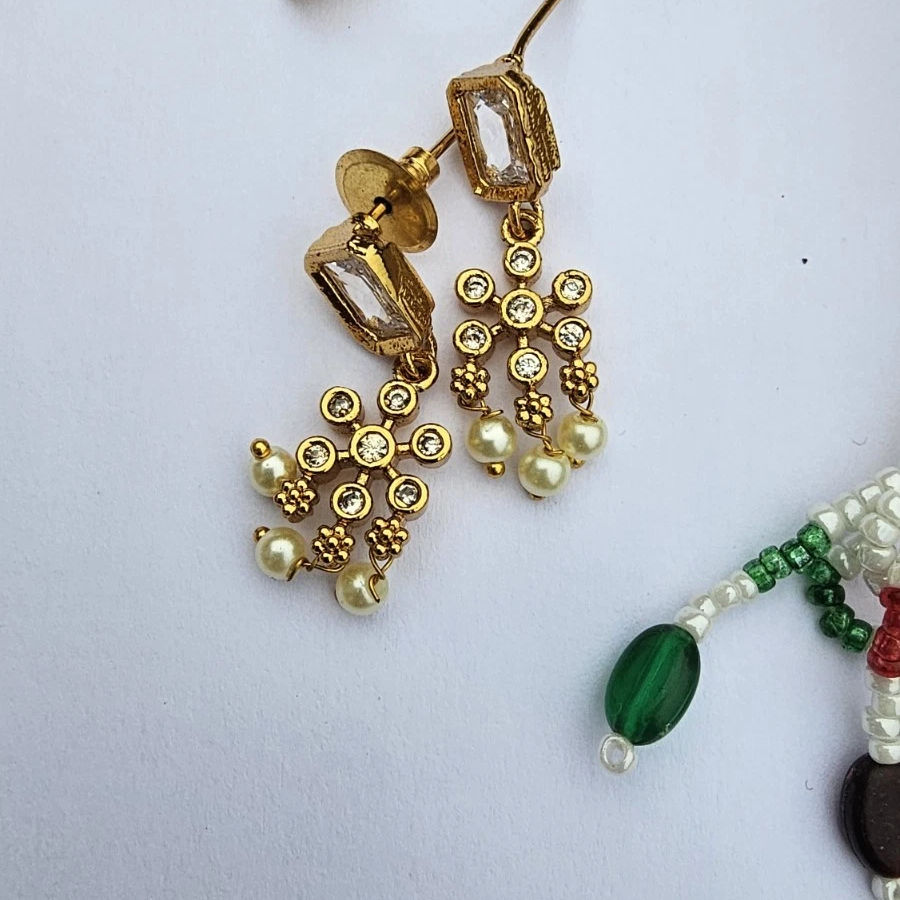 Thumbnail: Zivara "Inara" Gold-Plated Necklace and Earring Set with rectangular crystals and small pearl dangles.