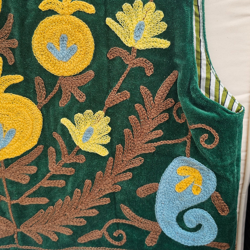 Thumbnail: Emerald Breeze green Suzani hand embroidered velvet vest featuring floral embroidery and traditional artisan craftsmanship.