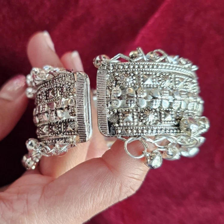 Thumbnail: Zivara "Sitara" Tribal Cuff- wide silver bracelet featuring multiple hanging Ghungroo bells.