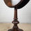 Thumbnail: A Victorian Burr Walnut and Mahogany Swivel Top, Drop Leaf Occasional Table