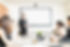 confident-mid-adult-businessman-giving-presentation-colleagues-boardroom.jpg