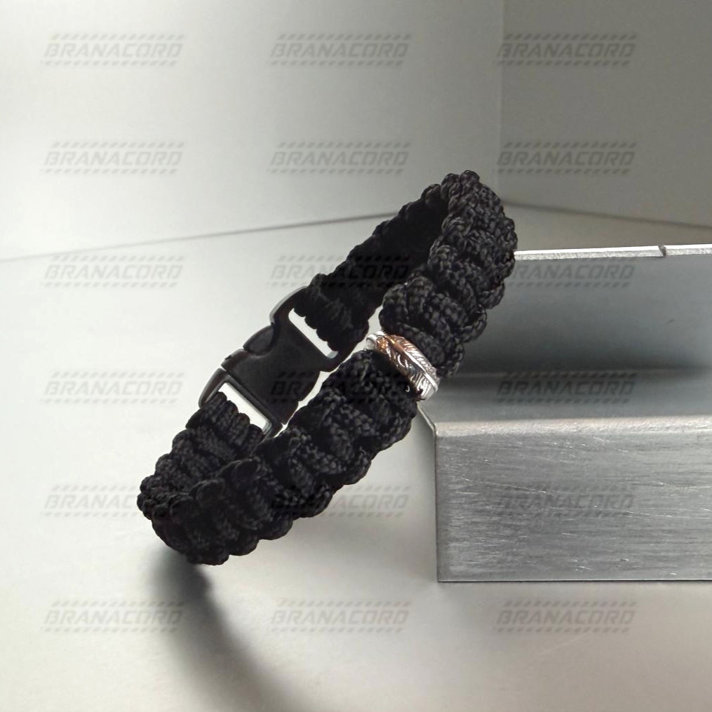 Federzauber, schlichtes Paracord Armband mit einer zarten Silber Feder