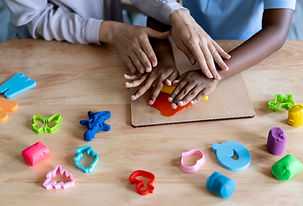 kid-doing-occupational-therapy-session-with-psychologist(1).jpg