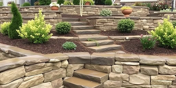 beautiful stone landscaping retaining walls all wet after being washed.jpg