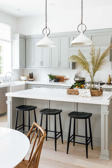 Light and airy kitchen in a Coral Gables home designed by Miami interior designer The Habitat Collective
