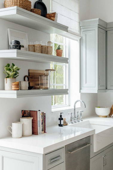 Light and airy kitchen in a Coral Gables home designed by Miami interior designer The Habitat Collective