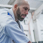 Brazilian Jiu-jitsu coach teaching a kid class