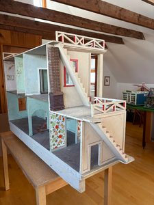 The dollhouse interior as it looked upon arrival at the Festival workshop.