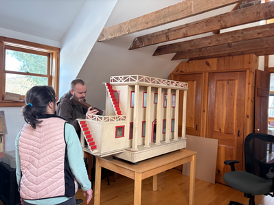 The dollhouse being delivered to the Festival's Brattleboro workshop.