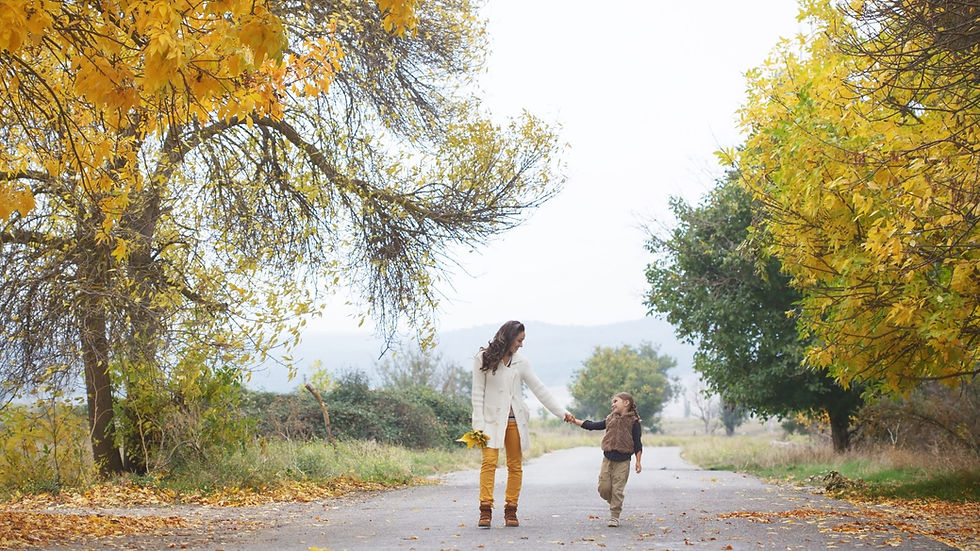 mother and daughter walking down the path