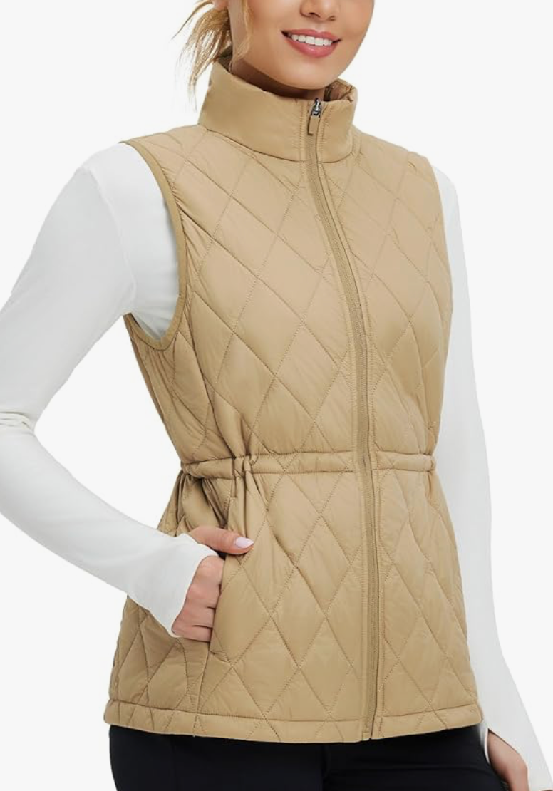 woman wearing a women's Baleaf puffer vest for hiking
