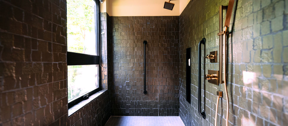 The expansive accessible shower at Twelve34 House
