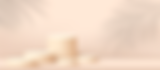 Various cylindrical podiums on a light peach background with leaf shadows.