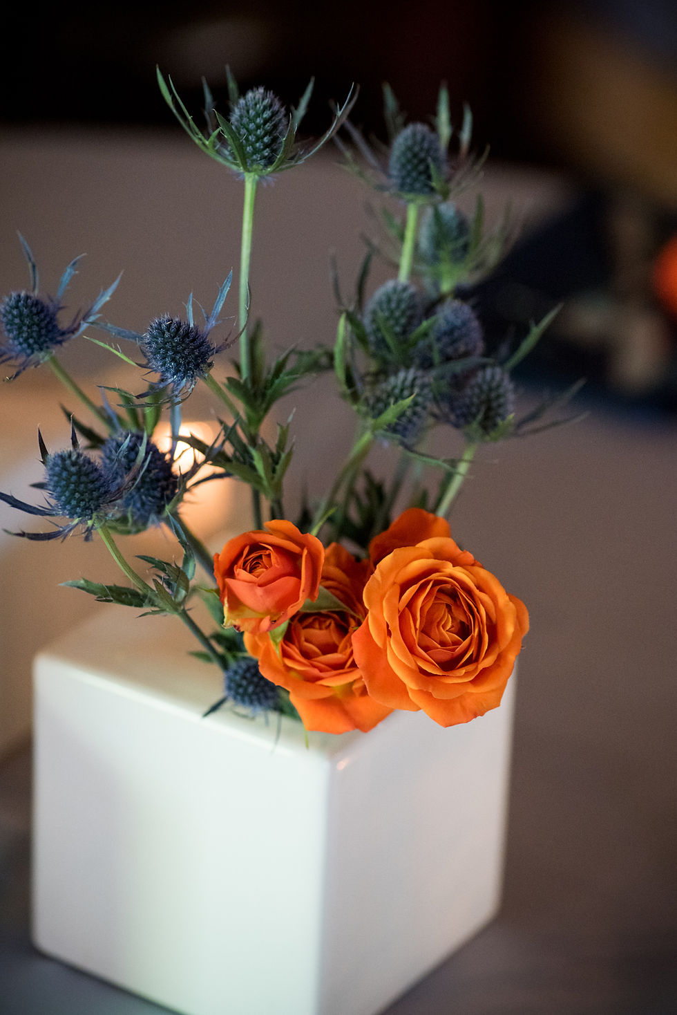 Orange and blue centerpiece by Visual Impact Design | Photo by Allison Stahl Studio