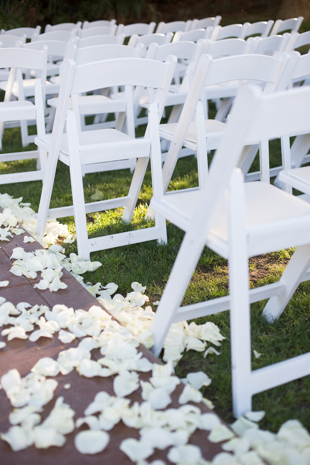 white aisle petals at ceremony