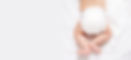 Cute caucasian infant baby in white nappy on light grey blanket. Top view. Banner format.