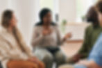 diverse people talking on a therapy session