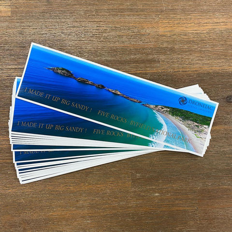 A stack of Yeppoon bumper stickers.