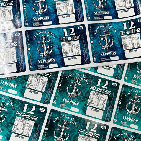A stack of product labels for eggs.