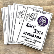A stack of Kinka Kippa flyers.