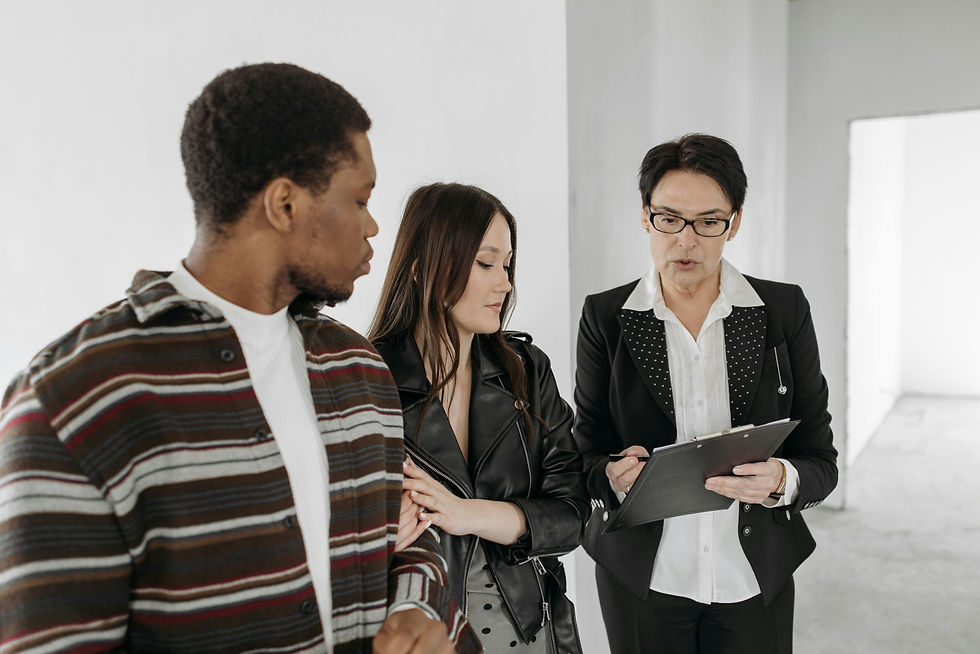 Property manager reviewing detailed inspection report with property inspector, highlighting safety checks, liability documentation, and maintenance recommendations for rental property management.