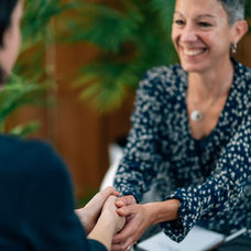 Business coach working with efficiency consultant to streamline backend