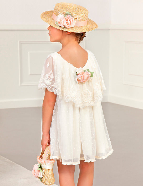 Miniatura: Vestido con flor detrás