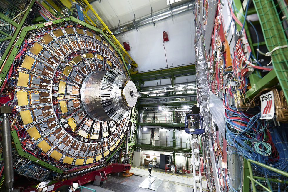 rutherford model of atom with protons, neutrons, quarks, gluons, electrons, elementary particles such as photons, bosons, higgs boson from cern cms atlas, fermilab particle physics