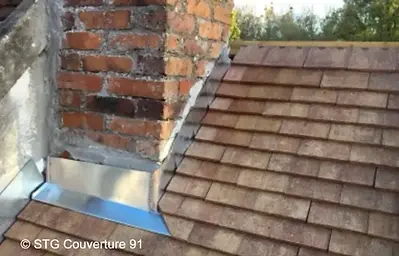 Création d'un abergement en zinc réalisé par un couvreur zingueur STG Couverture 91