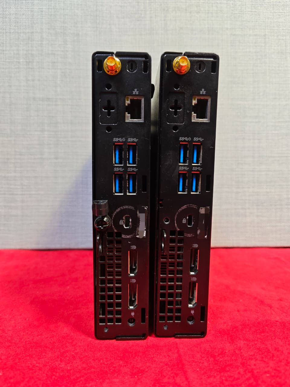 Thumbnail: Rear view of two Dell OptiPlex 3090 Micro mini PCs showing USB, LAN, and DisplayPort connections