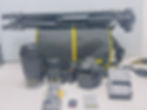 Nikon D5600 DSLR camera kit with two lenses, including the 18-55mm and 70-300mm, a camera bag, and a tripod.