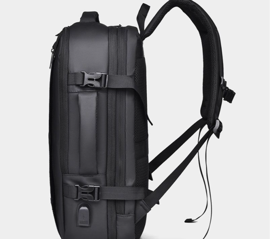 Thumbnail: Modern professional using a multifunctional laptop backpack with USB charging port and smart storage for work and travel.