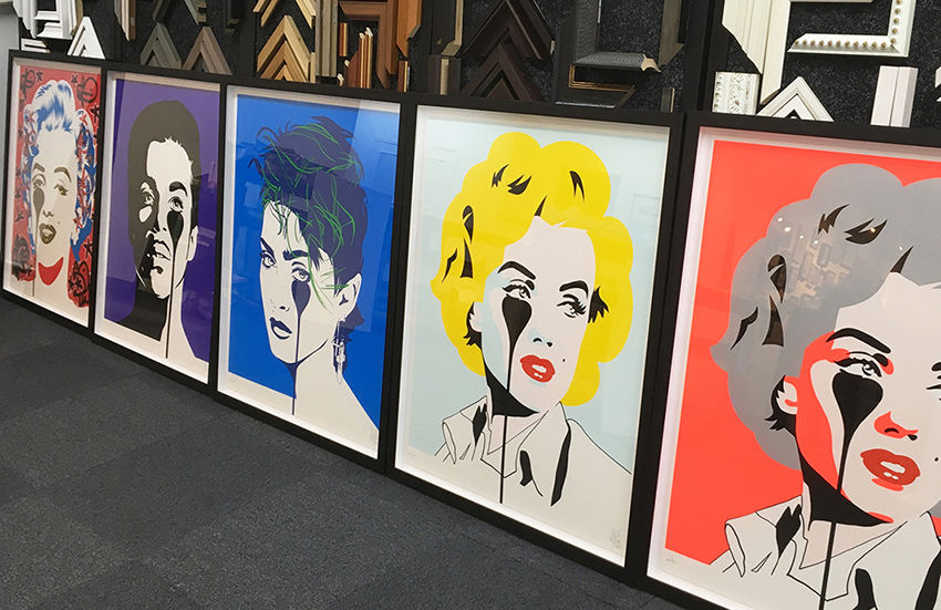 framing styles and ideas are displayed on a wall