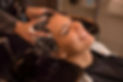 1200-93378711-woman-washing-hair-with-ma