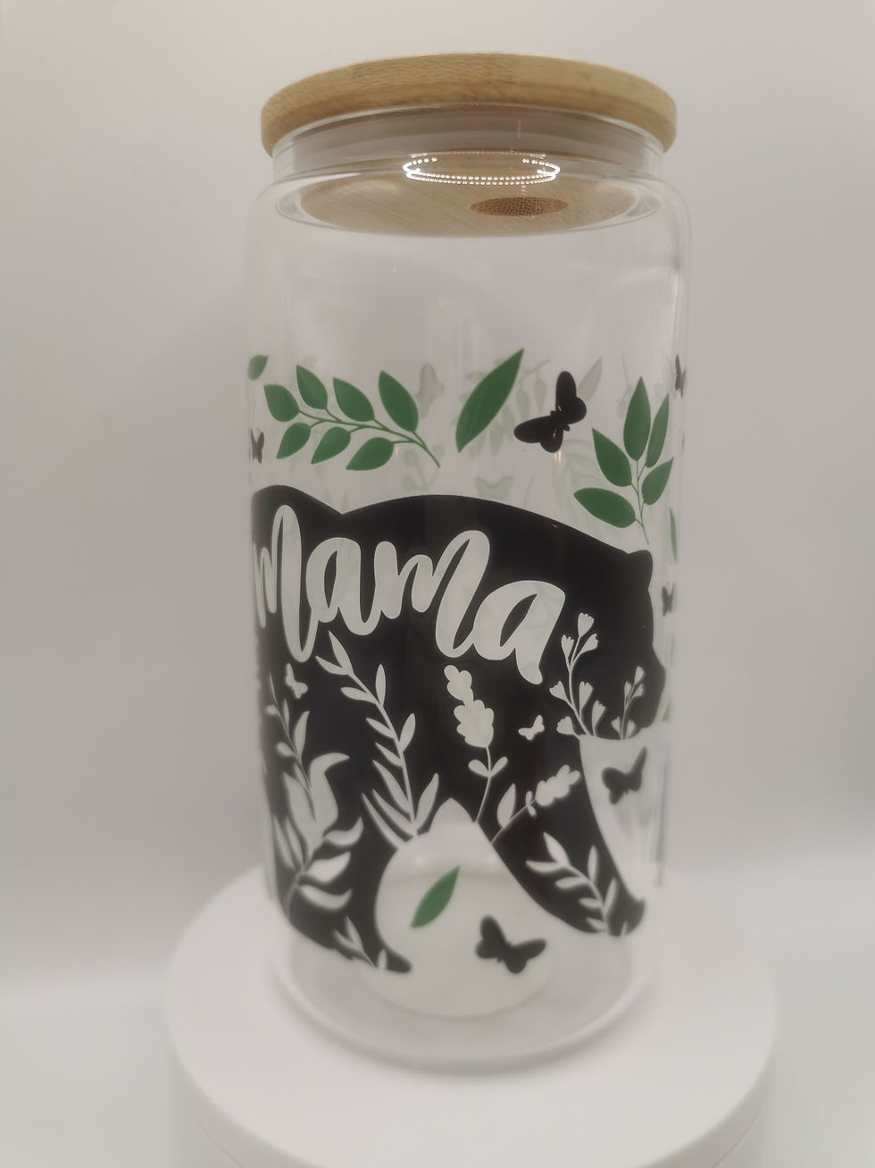 Thumbnail: Mama Bear glass tumbler with bamboo lid, 16oz glass cup featuring bear silhouette and leafy design