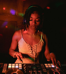 DJ BlackWoman, a self-taught DJ from Oakland, CA
