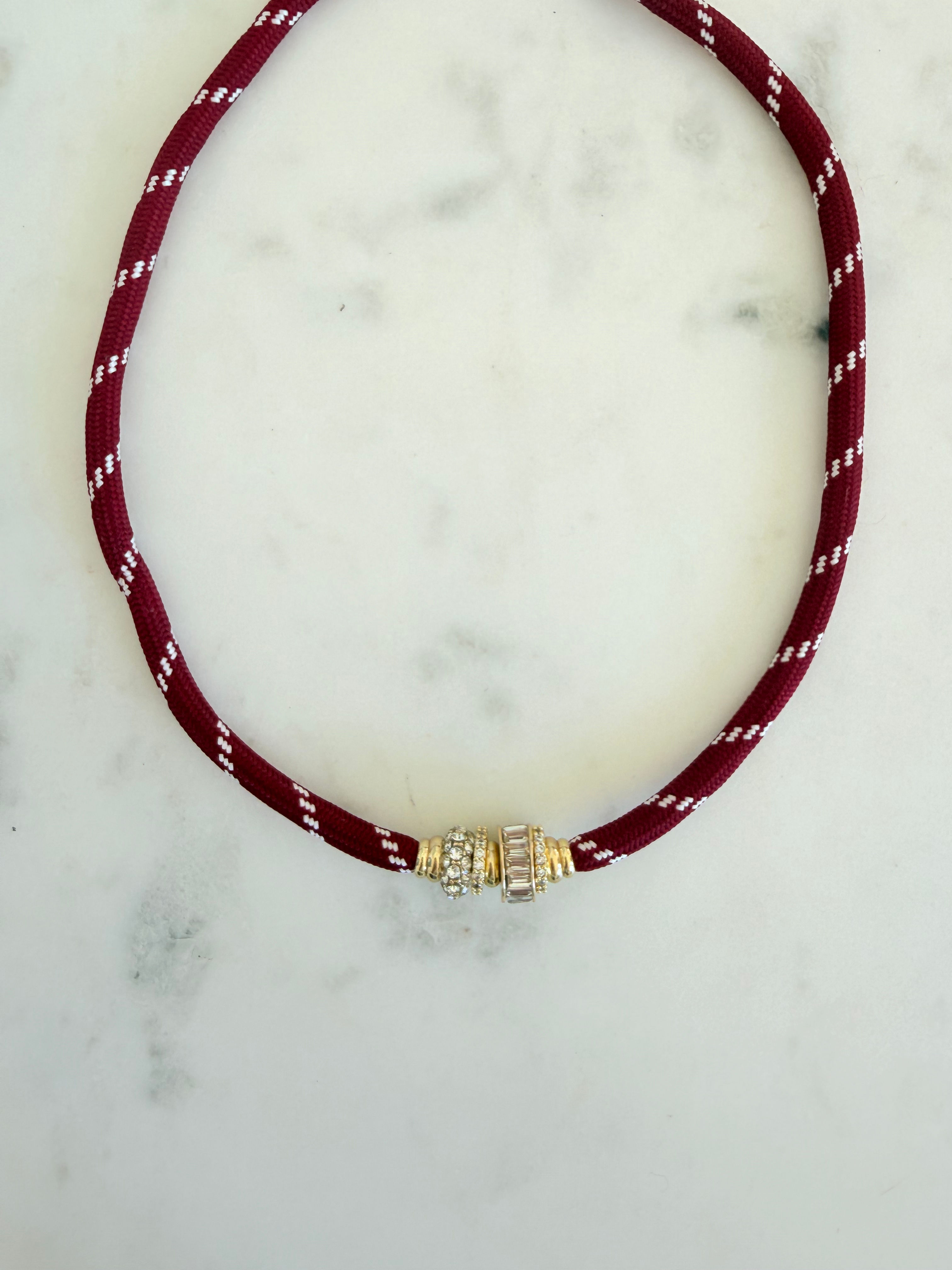 maroon paracord with gold and crystal beads 
