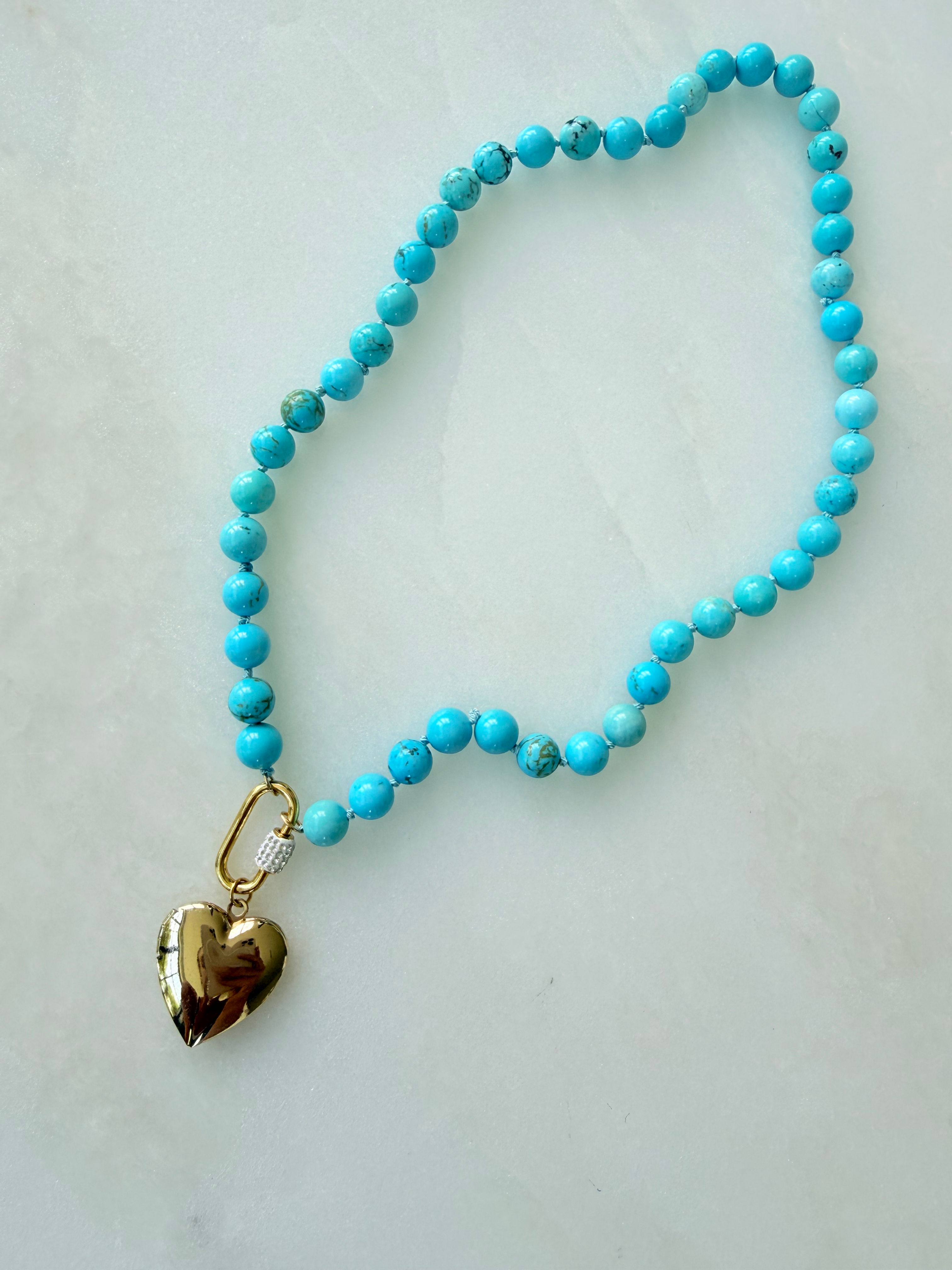 Knotted turquoise charm holder necklace