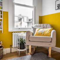 yellow lower walls in nursery 