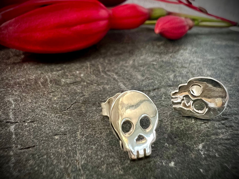Thumbnail: Pirate skull stud earrings
