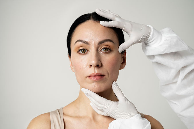 front-view-hands-holding-woman-s-head (1).jpg