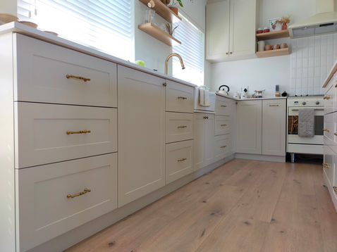 Shaker motive kitchen and Island with floating shelves