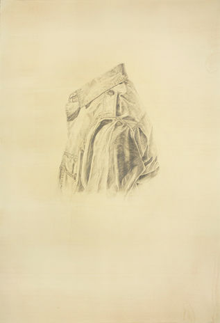 graphite drawing of shirt on yellow toned paper.