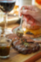 Close-up view of steak with chimichurri