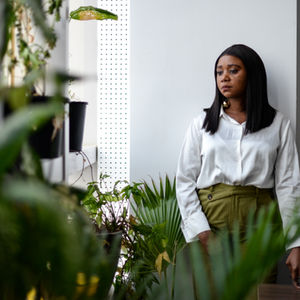 Eugenia Kargbo, Freetown's chief heat officer and Climate Resilience for All's African heat strategist, pauses in her office in Freetown, January 14, 2025. CRA/Olivia Acland