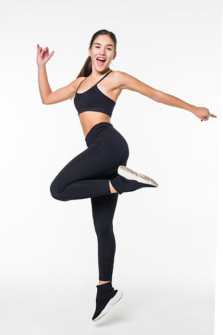 sporty-young-woman-jumping-isolated-on-white-wall.jpg