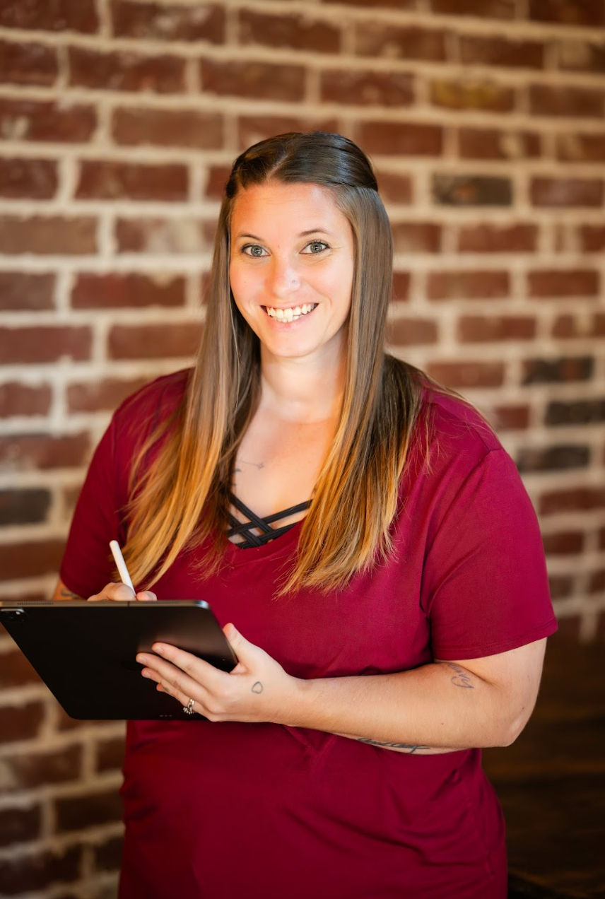 “Headshot of Ashlea Towery, Wichita Falls wedding planner and Director of Events at Occasions & Co., smiling at the camera.”