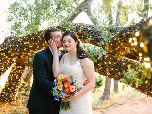 Bride and groom at Stonebridge Wedding & Event Venue, captured by Honey Wild Photography. Outdoor ceremony with romantic, elegant details.
