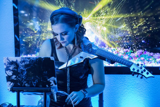 Razzvio Singer/violinist/DJ Razz is a songwriter and classically trained musician. She performs with her custom 7-string electric Viper Violin.