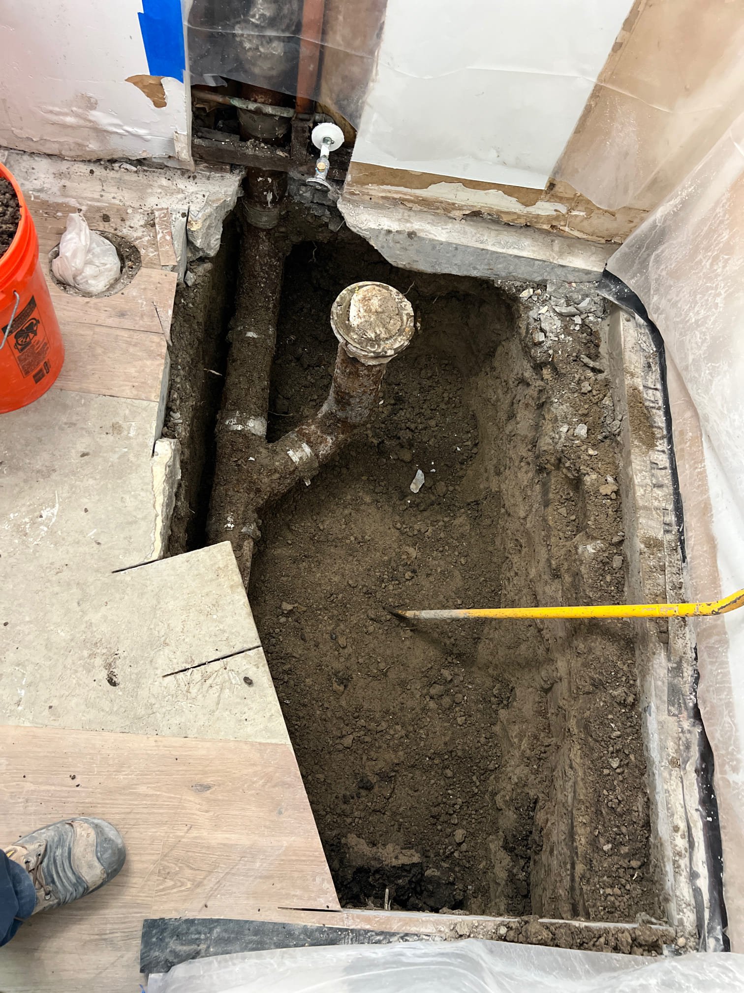 Image related to the cost of sewer line replacement, possibly showcasing trenchless methods. Could also illustrate signs of a clogged or damaged sewer line, like slow drains or backups, indicating the need for repair or replacement.
